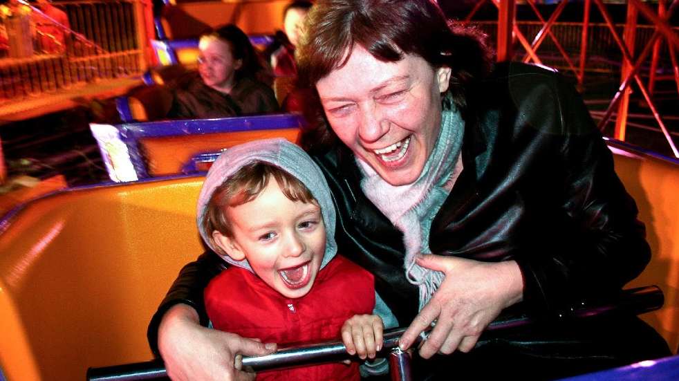 Man and boy on rollercoaster